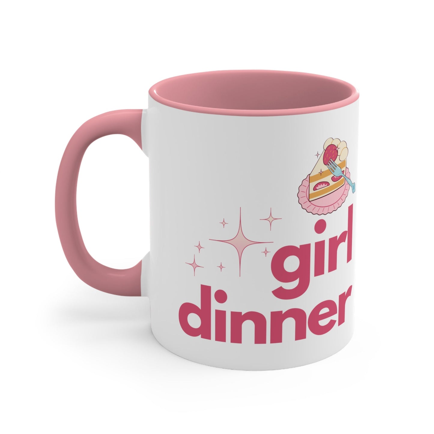 A White and Pink mug that reads &quot;Girl Dinner&quot;. Design features Pink lowercase fonts and a slice of Kawaii strawberry cake.